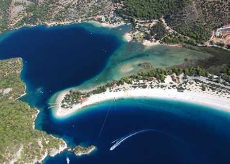 Luxury bareboat sailing yachts and catamarans anchored in Ölü Deniz around Fethiye , Turkey.