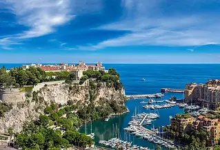 Luxury Yacht Charter – Discover Monte Carlo: Stunning views overlooking the beautiful harbor town, the vibrant waterfront, and the coastline.