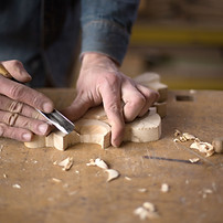 Carpenter Craving in Wood