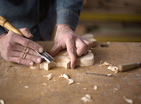 Carpenter Craving in Wood