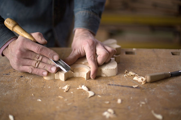 Carpenter Craving in Wood
