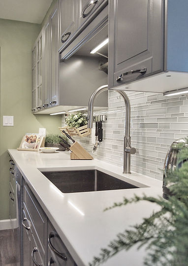 Happy Home Design demonstrates how to create a light and airy kitchen in a Vancouver's condo