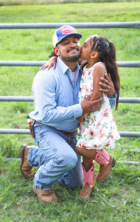 father and daughter embracing