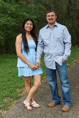 Couples photo on a gravel road at the Brackenridge Park in Jackson County, Tx