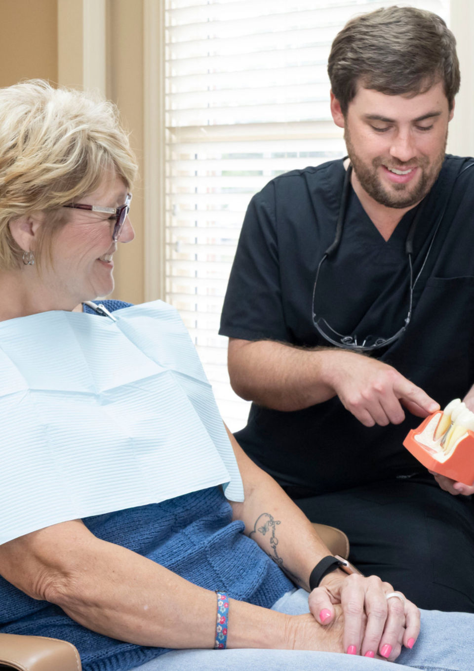 Dentist consult with patient