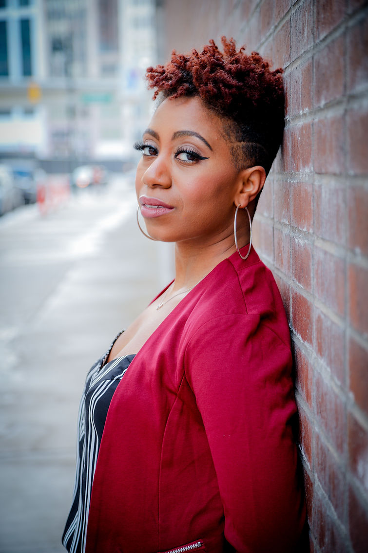 Headshot photo of Arielle Crosby