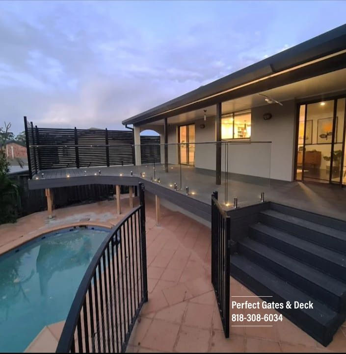 Custom Wood Balcony Deck with Glass Railing.jpg