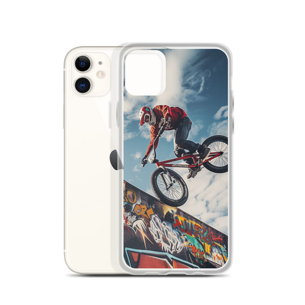 Graffiti Air Clear case for iPhone 11, BMX rider above graffiti ramp, with phone beside case on white