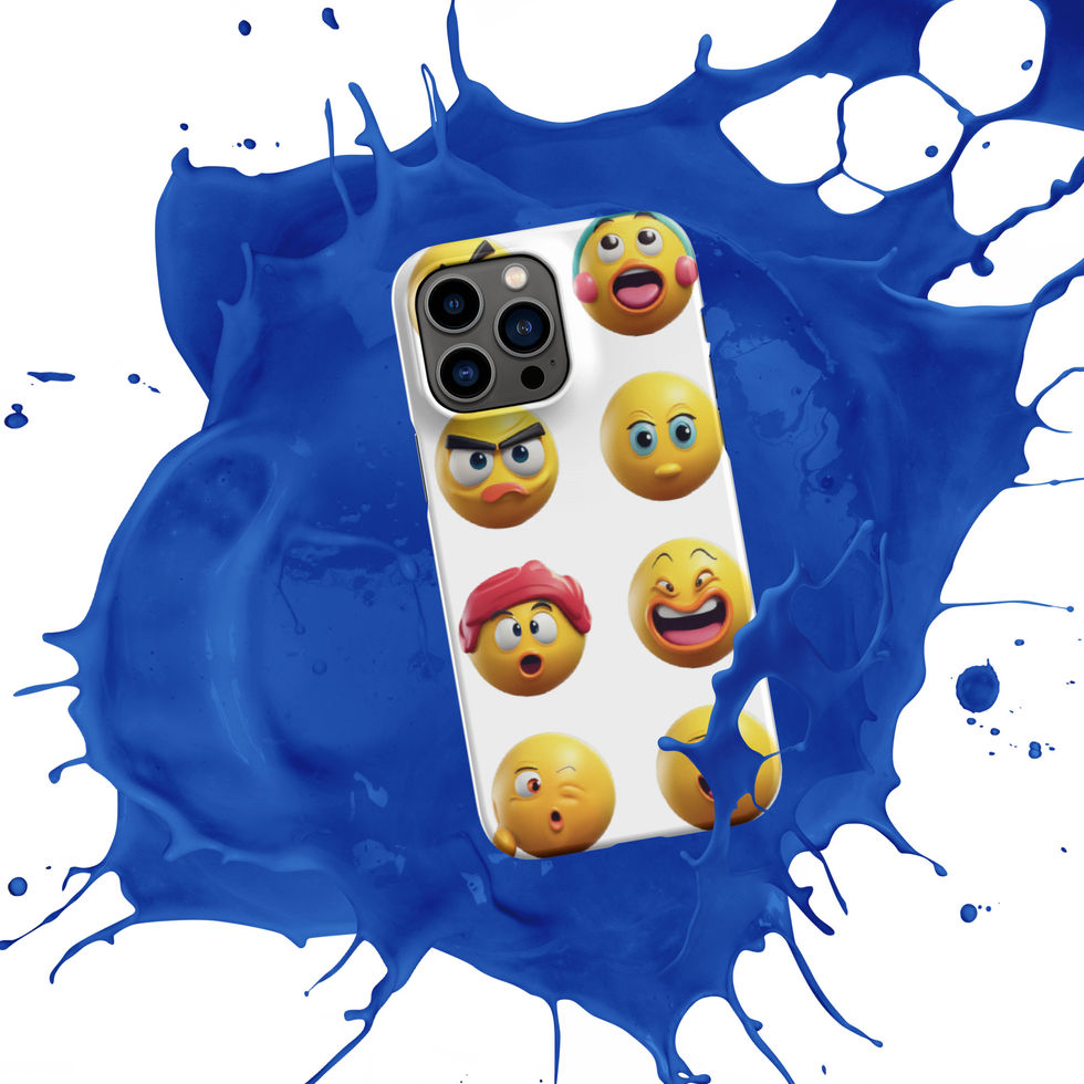 Emoji Frenzy snap iPhone case showing six bright expressions across its upright design, over a blue paint splash.