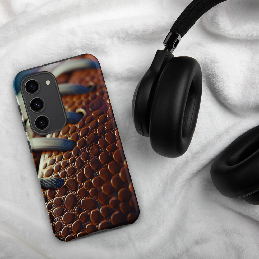 Gridiron Grip Tough case for Samsung Galaxy S23, football laces artwork beside headphones on pale fabric.