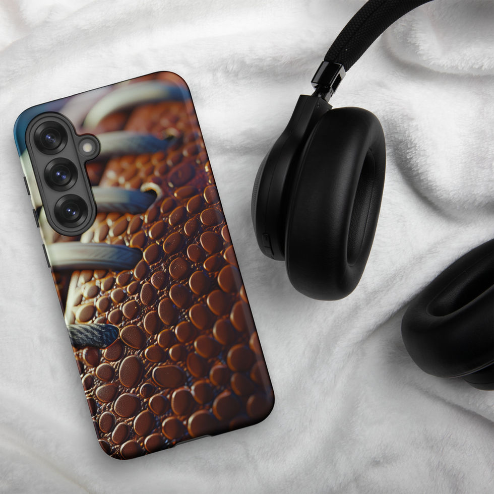 Gridiron Grip Tough case for Samsung Galaxy S25 Plus, football laces artwork beside headphones on pale fabric.