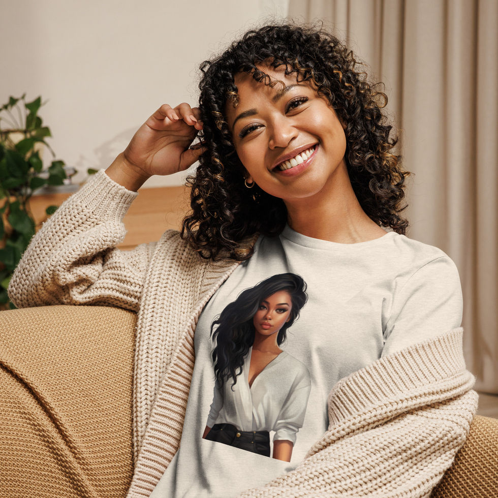 Confident Glow: cream women's relaxed T-shirt with a dark-haired woman in a white blouse, worn by seated woman