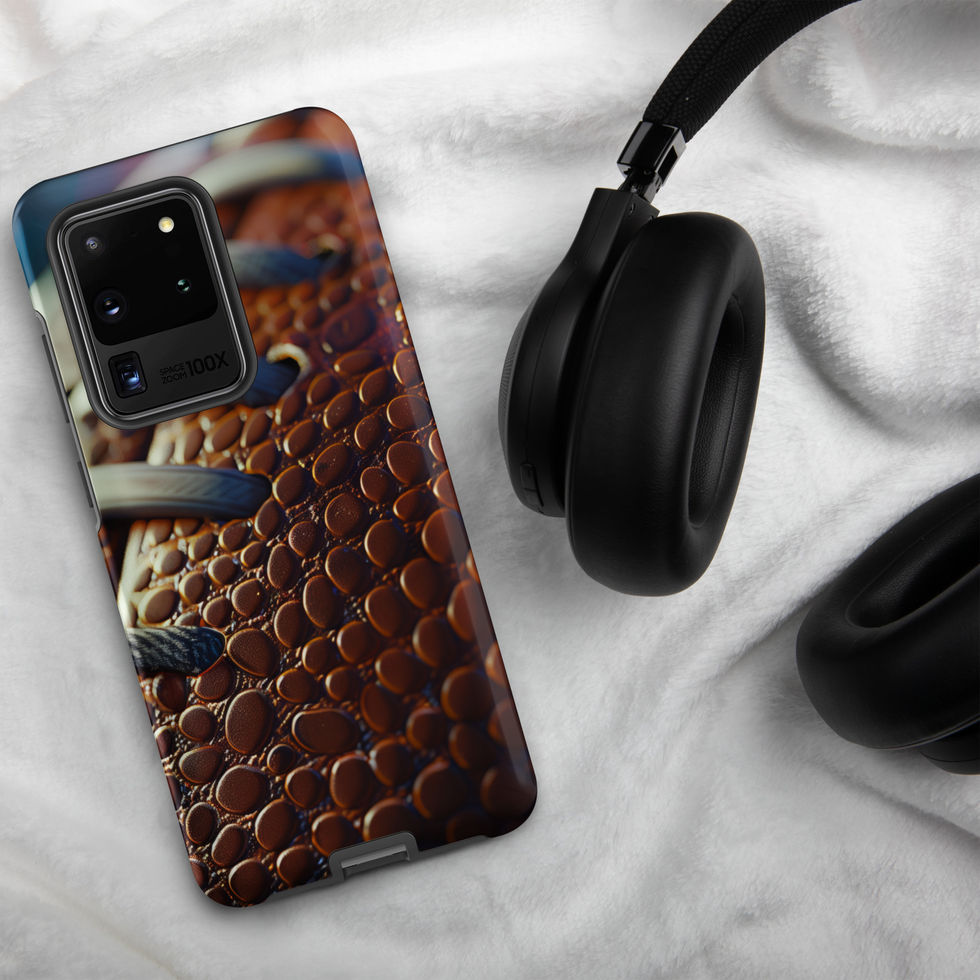 Gridiron Grip Tough case for Samsung Galaxy S20 Ultra, football laces artwork beside headphones on pale fabric.