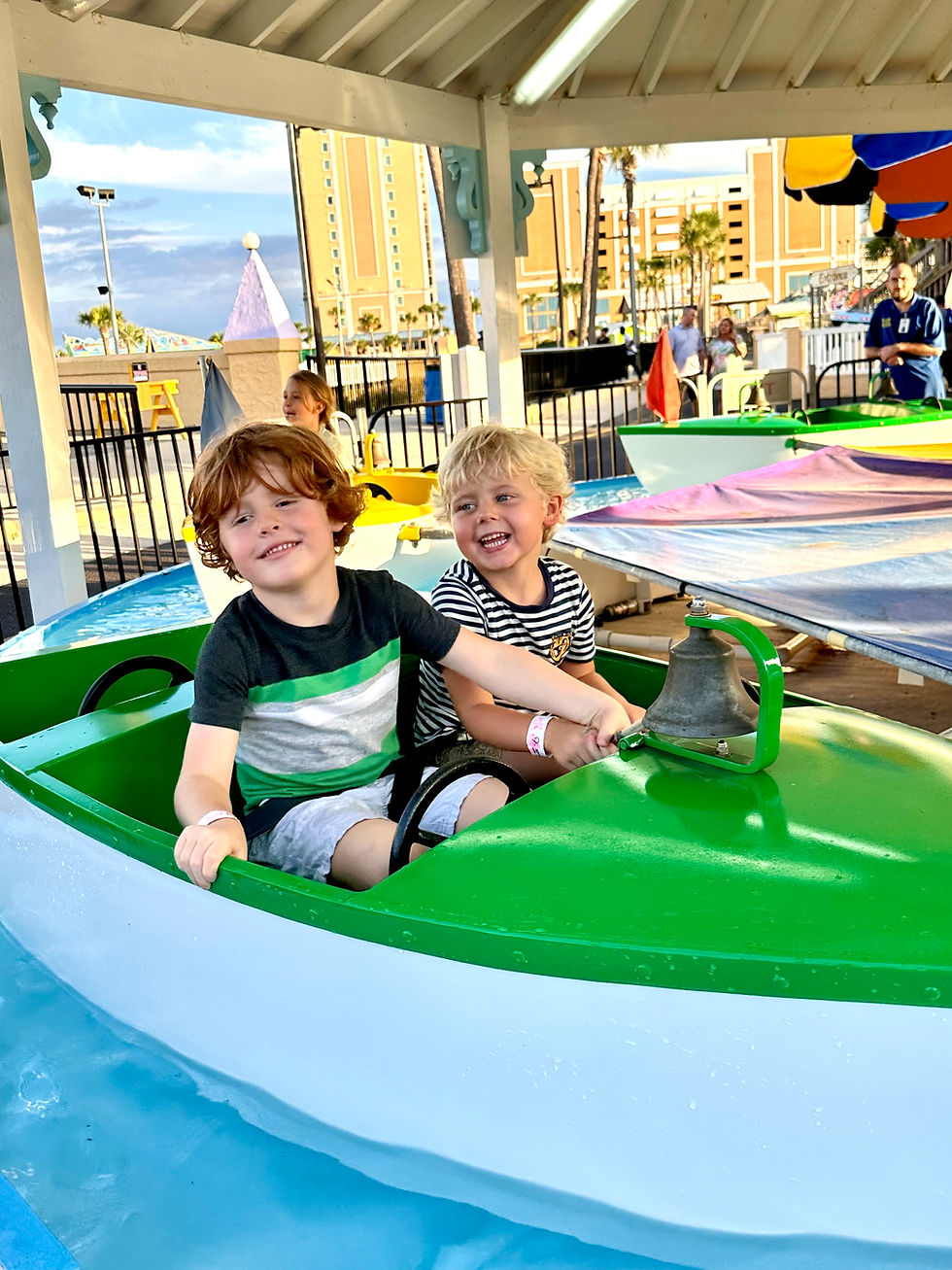 Two boys on a ride called Wet Boats