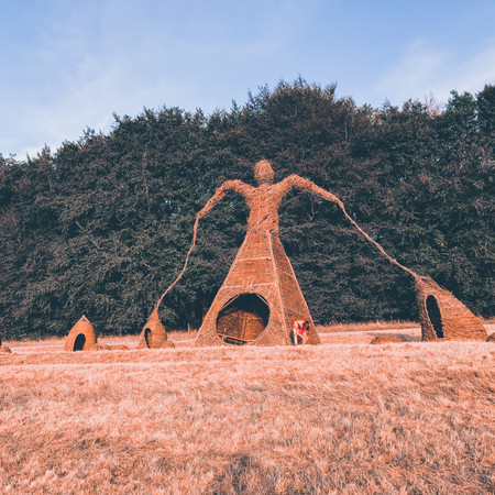 Willow Man Sculpture, 9 meter Wicker Giant, Boomtown Festival By Professional Basketmakers Issy Wilkes and Jenny Crisp