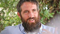 Aharon directs the Ohr Torah Interfaith Center, which works with religious leaders worldwide on global challenges. He co-founded MAKOM, the umbrella body for intentional communities in Israel, and founded Hakhel, which won the 2020 Jerusalem Unity Prize. His book Seven applies Shmita principles to economics and the environment.