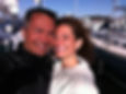 Peter and Sanaz standing on the docks in San Francisco after arriving by sailboat