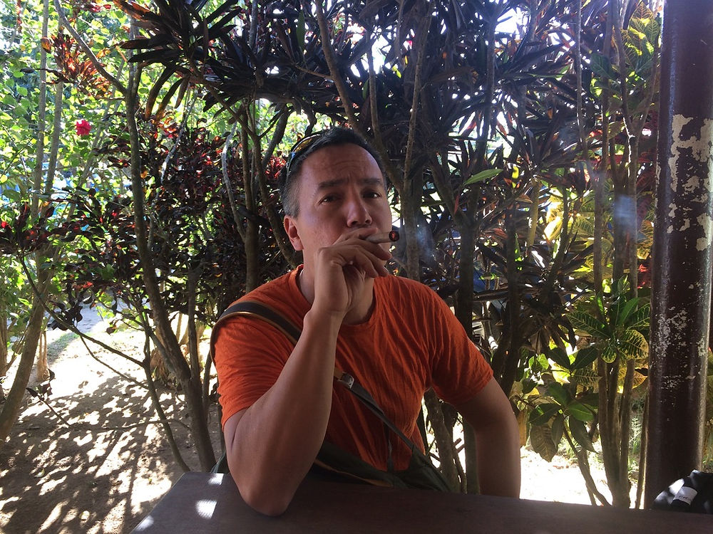 Man smoking Cuban cigar