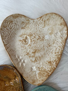 Buy Sanaz Busink unique handcrafted custom pottery ramekins to hold small items such as jewelry, or as a tea bag holder. Heart shaped.