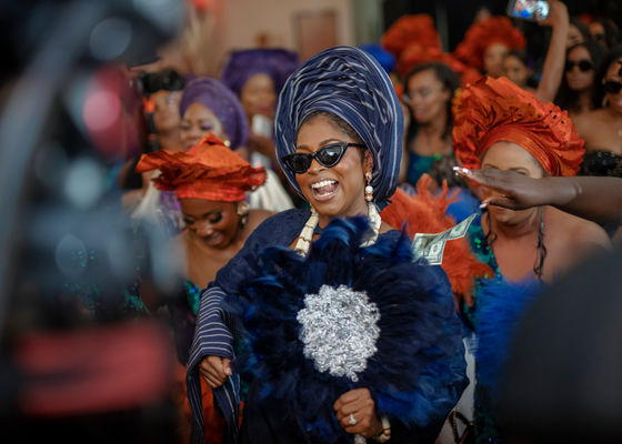 Gorgeous African bride celebrating with her wedding party - Allure Planning Services wedding