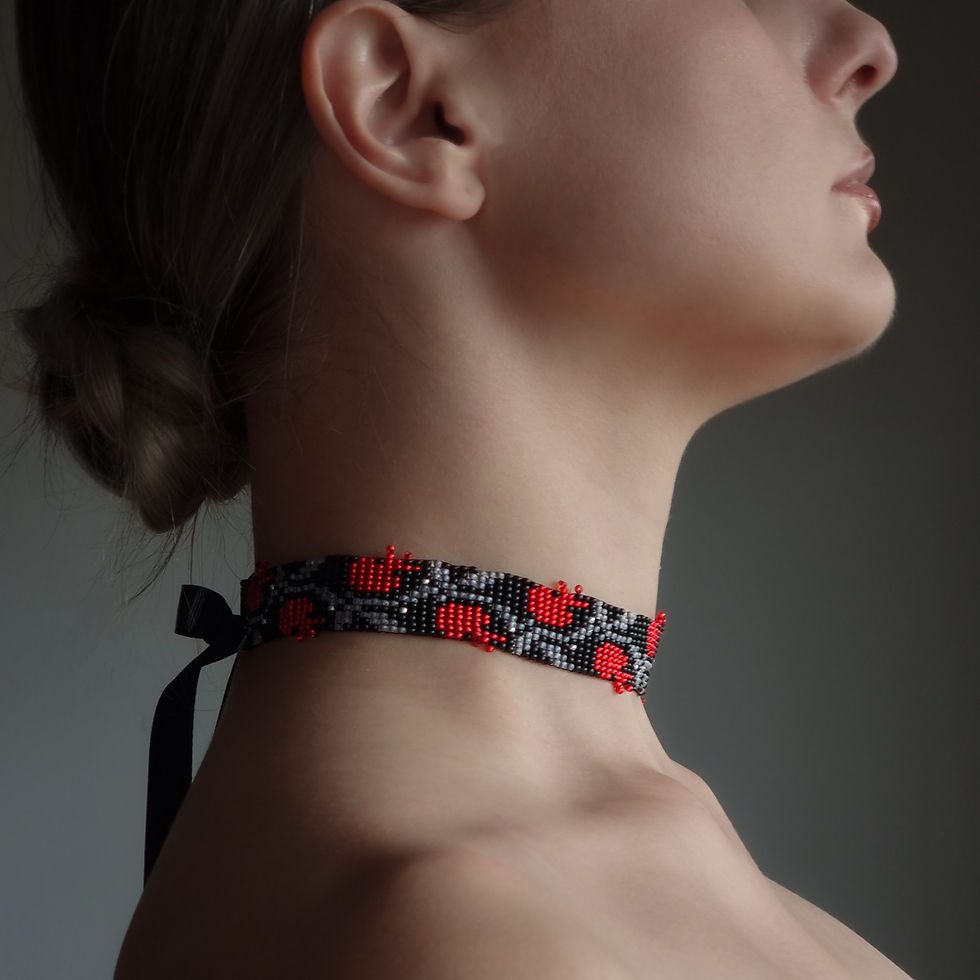 Side view of the Black Beaded Choker Necklace highlighting its fit and ornamental texture.