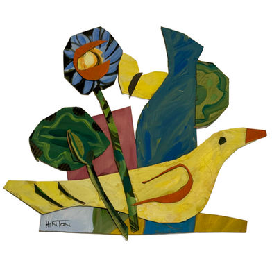 Painted cardboard sculpture of yellow bird and foliage