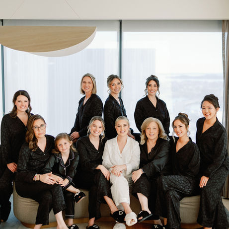 Juliana and her bridesmaids in black and white pajamas