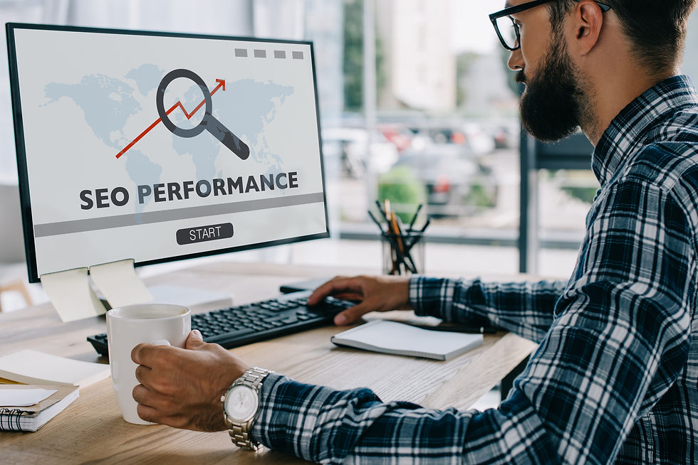 focused man working on seo performance at desk