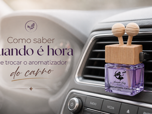 Aromatizador de carro Lunna Luz Aromas pinçado na saída de ar do painel, cenário de interior automotivo iluminado por luz natural.