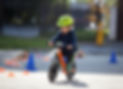 Child in helmet ride balance bike (run bike)_edited.jpg