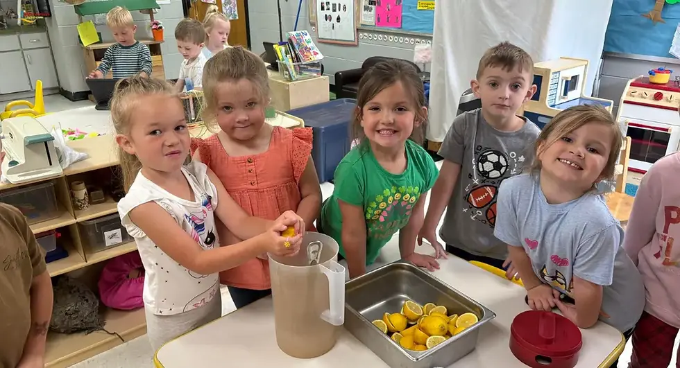 Kids making lemonade at childcare in Houston TX