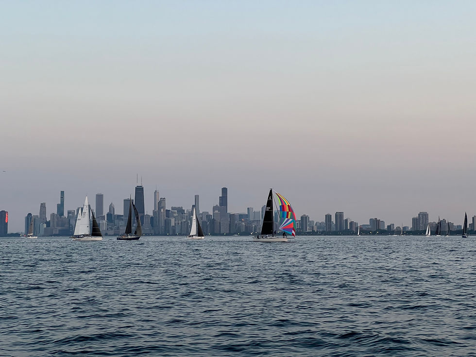 Sailboats racing on Lake Michigan with Chicago in the background