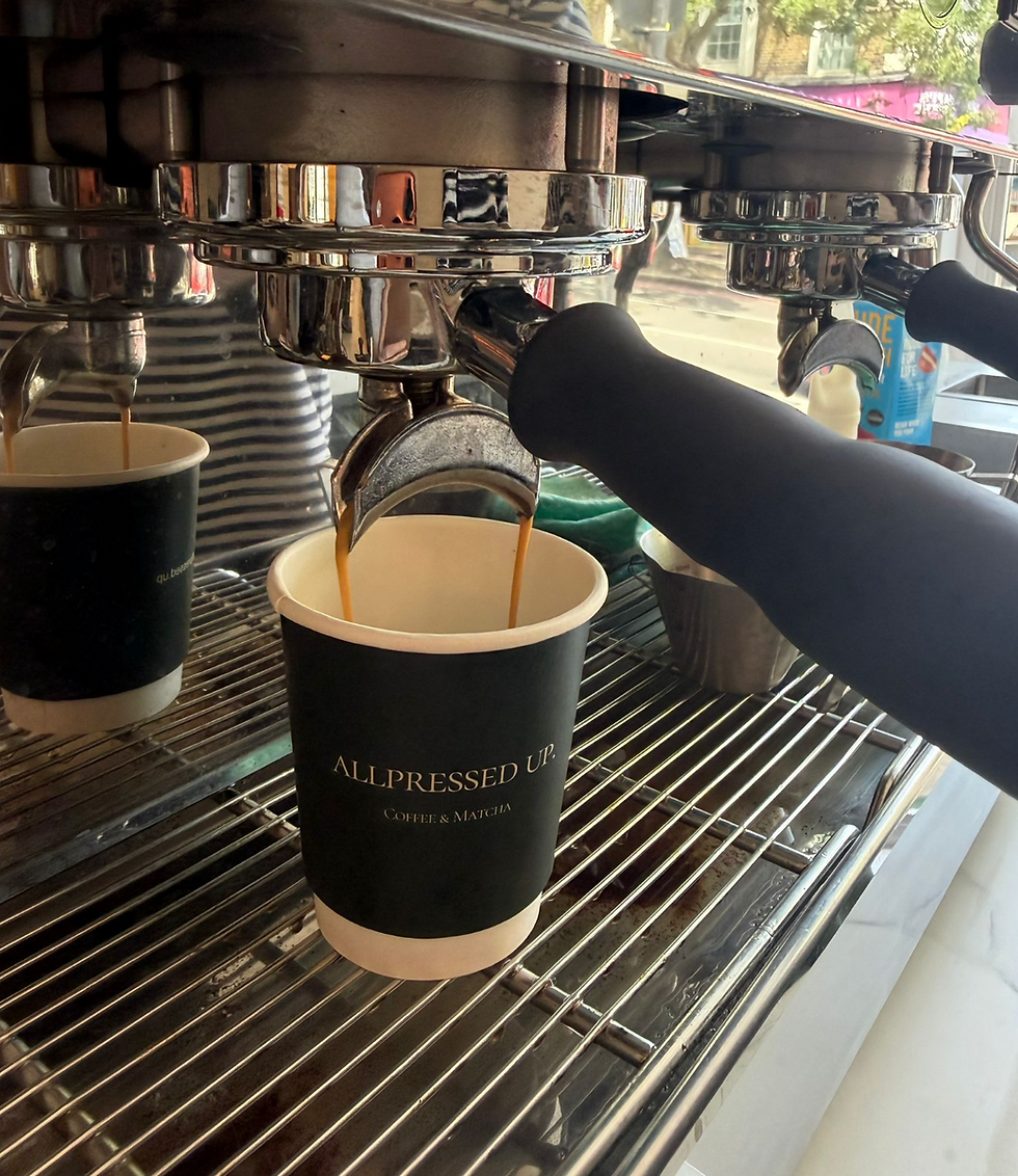 Espresso pouring into a cup at this cozy remote work cafe Camden.
