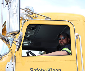 A middle aged man in a Semi-tuck. 