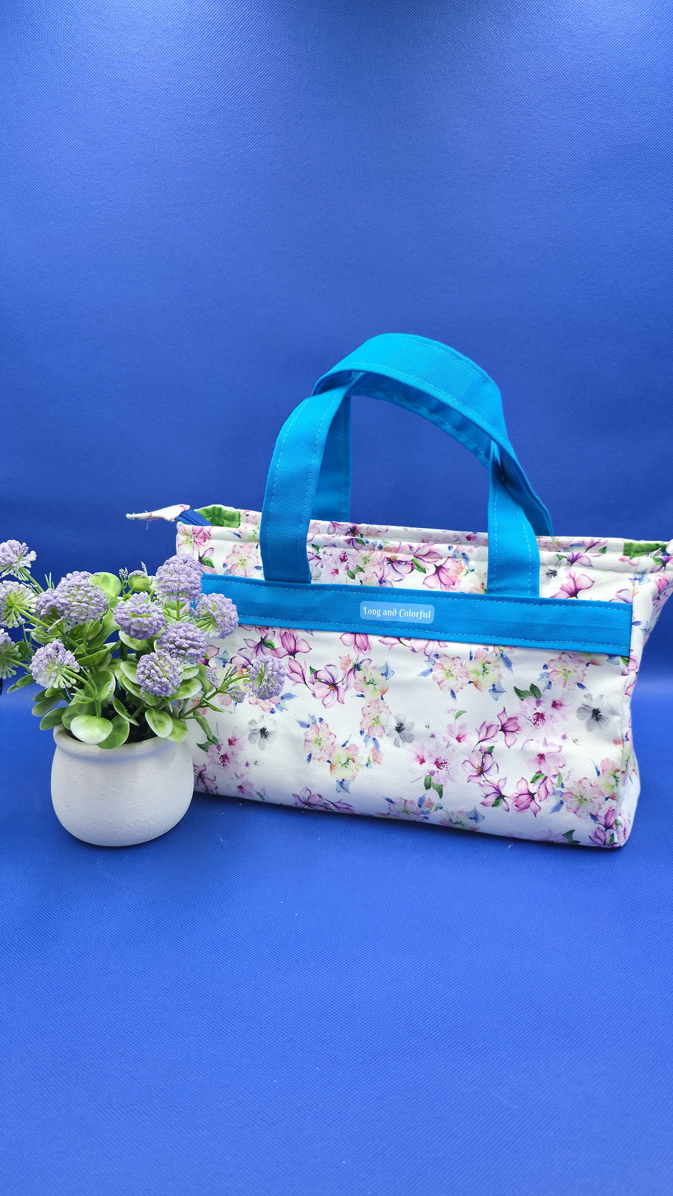 handtas met Lila bloemen en Lila band