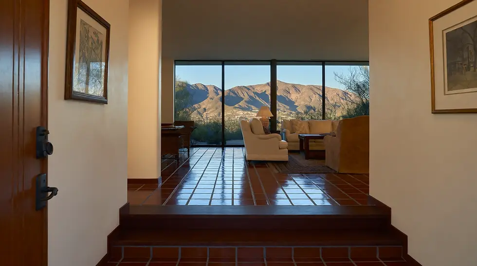 Sunken living room step in a Catalina Foothills home, a common fall risk for seniors