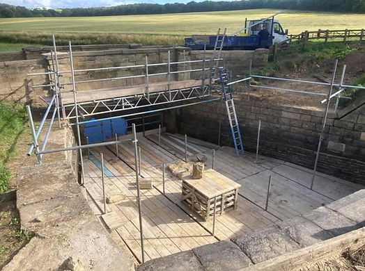 Stone bridge with scaffolding