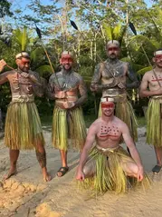amazonian adventure where lewis and others are pictured with the matses tribe