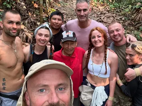 amazonian adventure where lewis and others are pictured with the matses tribe