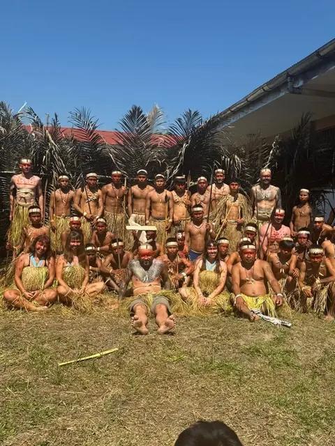amazonian adventure where lewis and others are pictured with the matses tribe