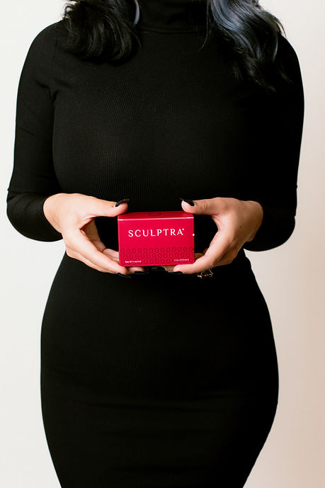 Jade holding Sculptra