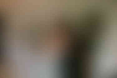 Couple snuggling and laughing during their editorial engagement session