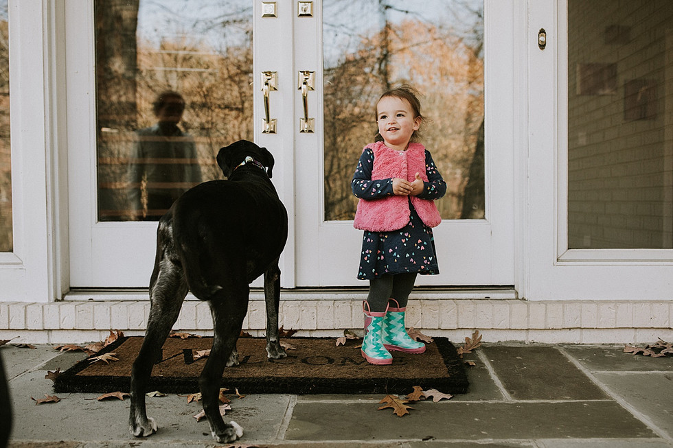 Toddler with her dog