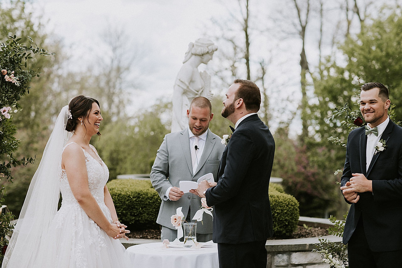 Couple laughs during Nemacolin wedding ceremony in Pittsburgh
