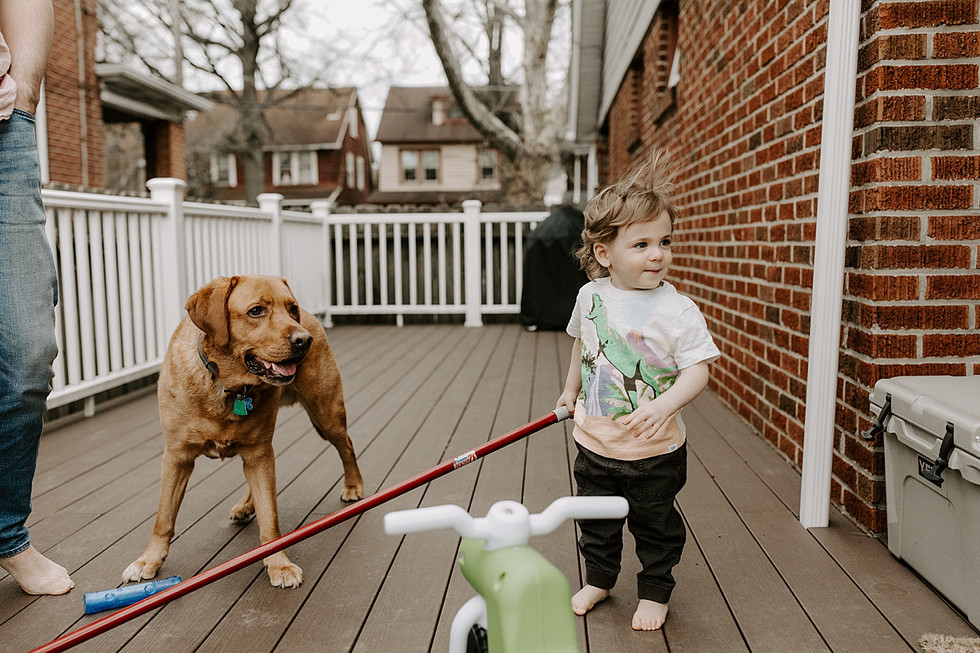 Kid outside with dog