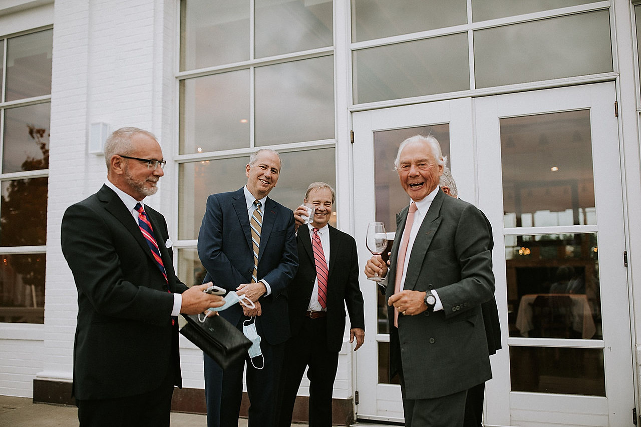 Guests talking at wedding