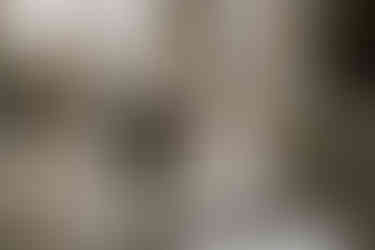 Couple walking across crosswalk in downtown Pittsburgh