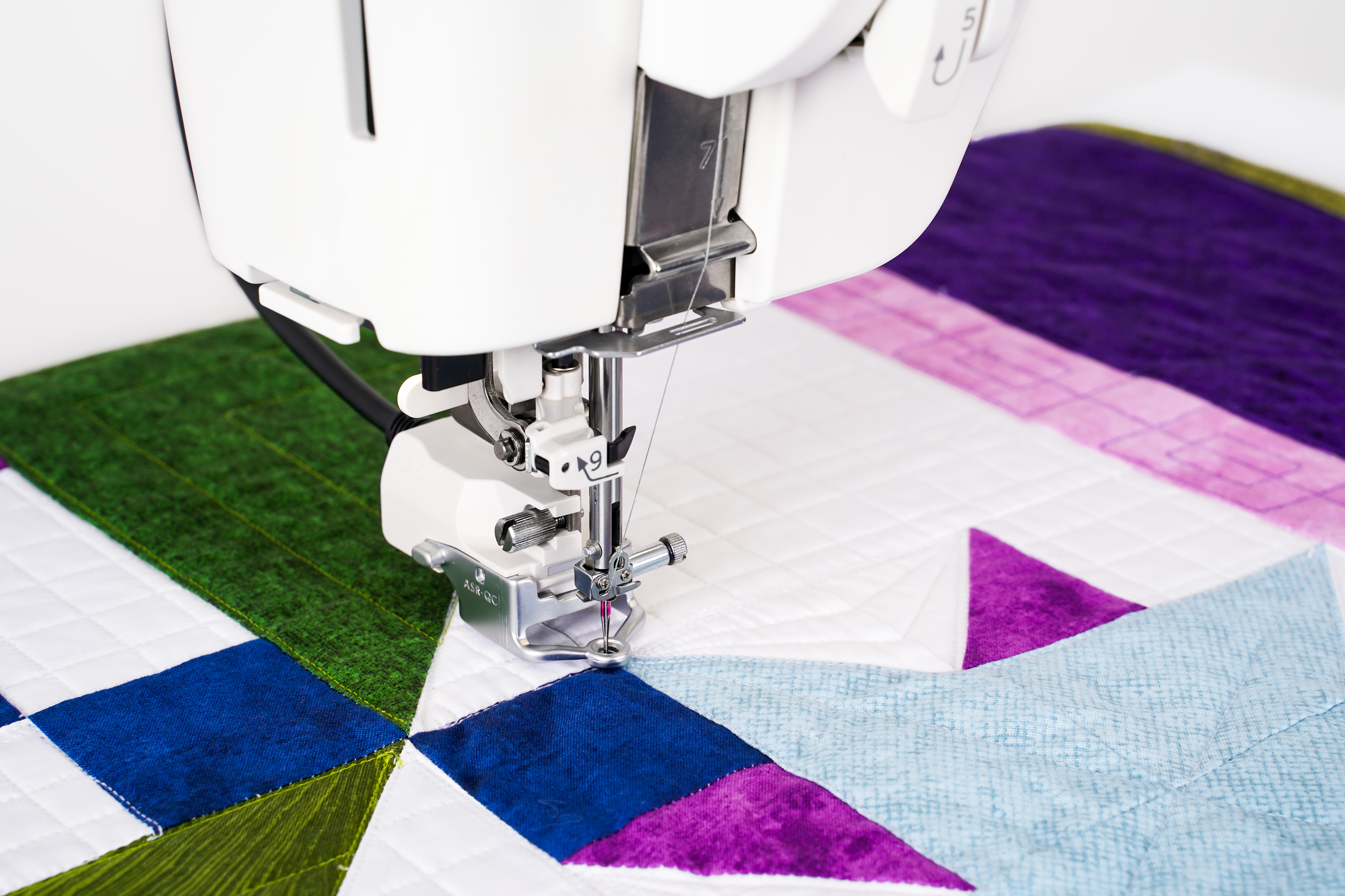 Decorative patchwork quilting being sewn on the Janome Continental M8 Professional