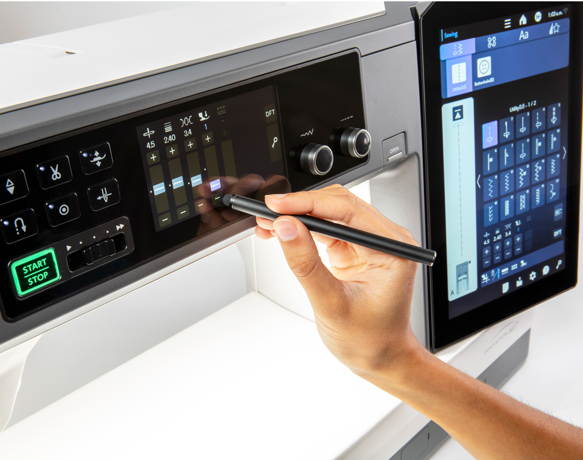 Janome Continental M17 dual touchscreen controls being adjusted with the stylus