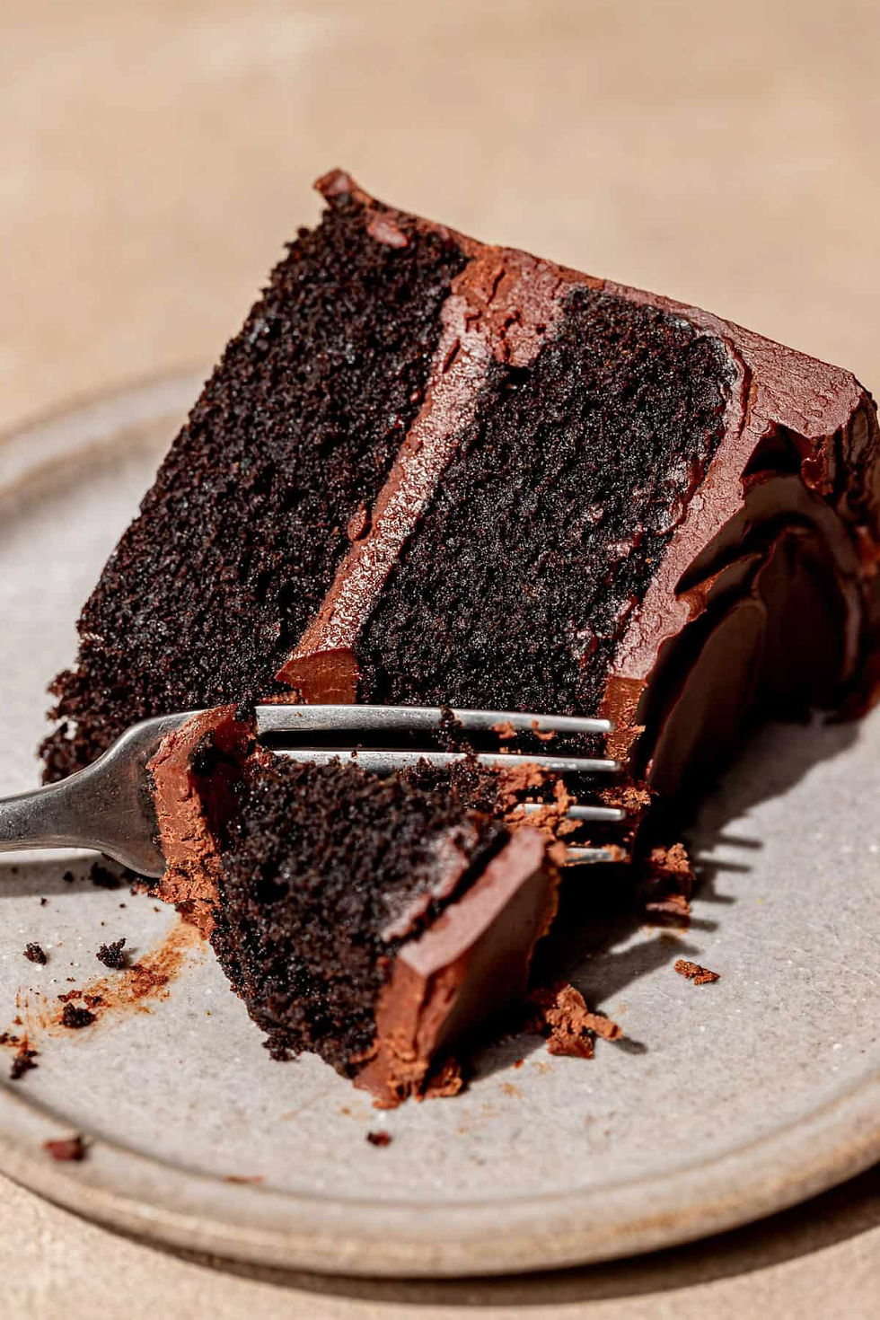 Slice of chocolate cake with chocolate frosting